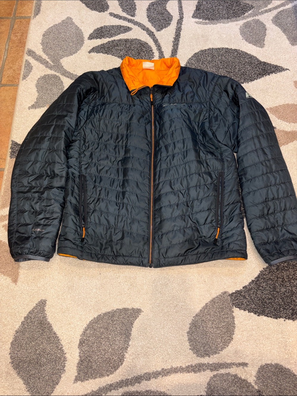 Men's reversible Quilted Jacket from Eddie Bauer- Black with Orange